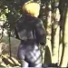 A girl takes a shit at an outdoor location. Older video taken from VHS. About a minute.